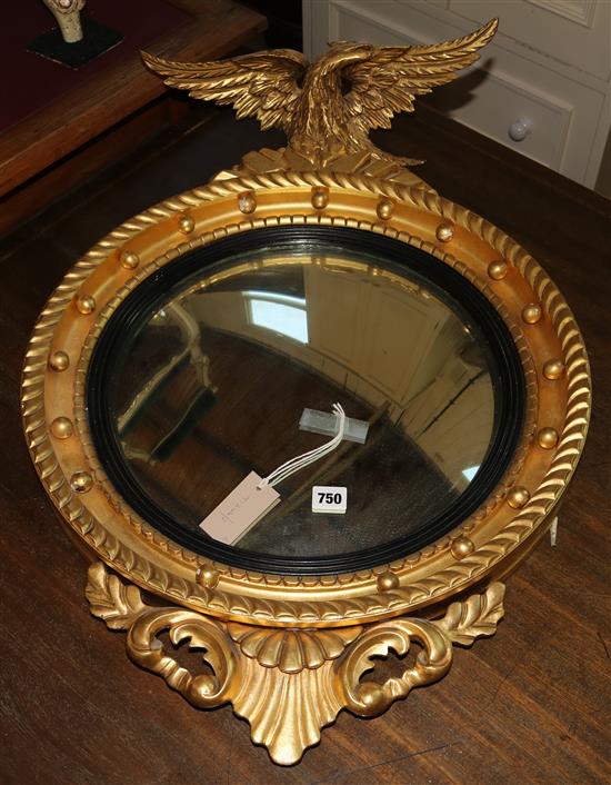Regency style gilt-framed  circular wall mirror